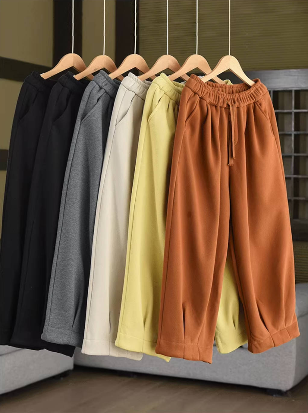 Pantalones de invierno de algodón grueso con cintura elástica y cordones de felpa, holgados y cálidos.