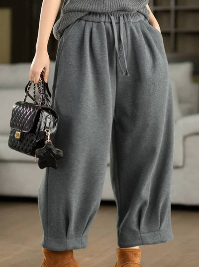 Pantalones de invierno de algodón grueso con cintura elástica y cordones de felpa, holgados y cálidos.