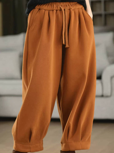 Pantalones de invierno de algodón grueso con cintura elástica y cordones de felpa, holgados y cálidos.