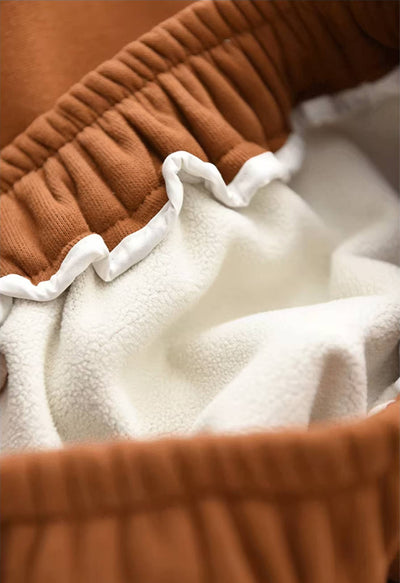 Pantalones de invierno de algodón grueso con cintura elástica y cordones de felpa, holgados y cálidos.
